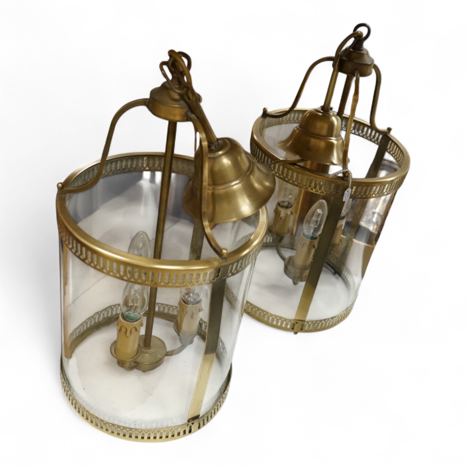 A pair of French brass and glass three light cylindrical lanterns, 65cm high overall